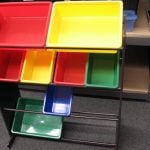 Plastic Storage Bins on Shelf